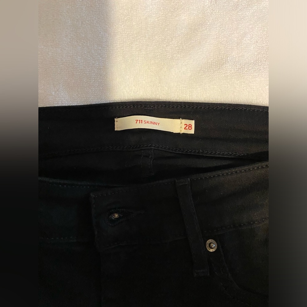 NWOT women’s 711 skinny jeans in black size 28